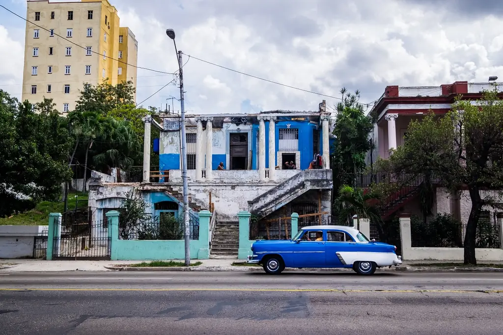 Rusty buckets with rustic buildings. Just throw a little blue paint on them and they're good as Cuban. Photo: Jason Napolitano